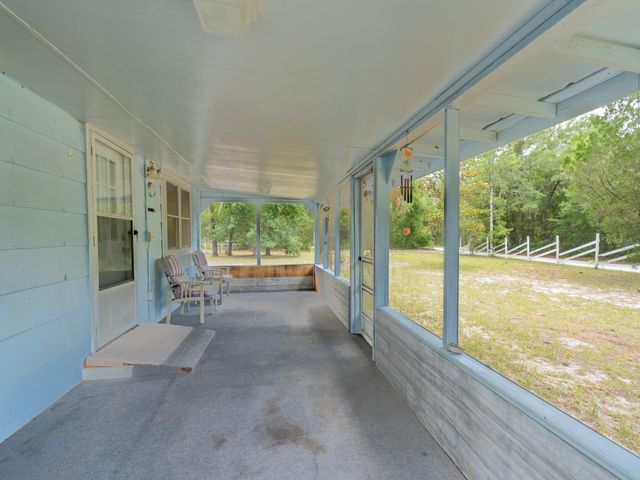 15265 COUNTRY CLUB BOULEVARD, Fort Mc Coy, FL 32134