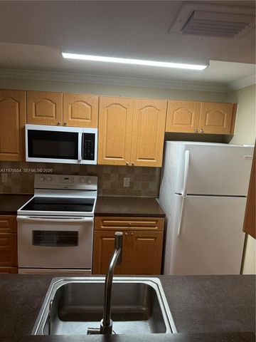 7165 NW 186th St A204, Hialeah, FL 33015