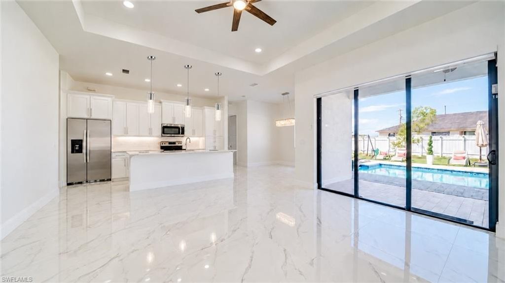 1447 SW 1ST ST, CAPE CORAL, FL 33991 — photo 3