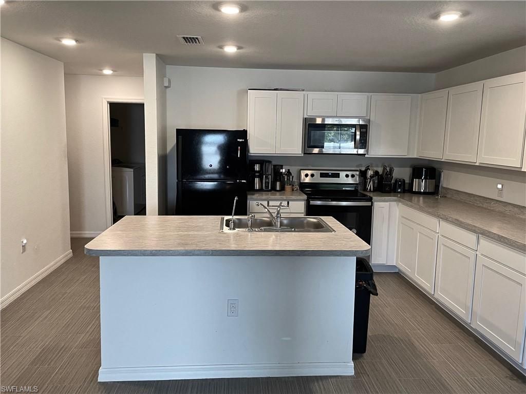 1818 NE 21st ST, CAPE CORAL, FL 33909 — photo 3