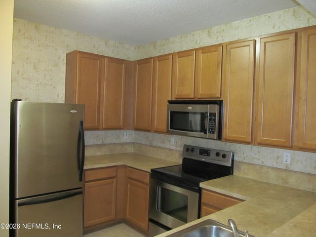 2200 MARSH HAWK Lane 306, Fleming Island, FL 32003