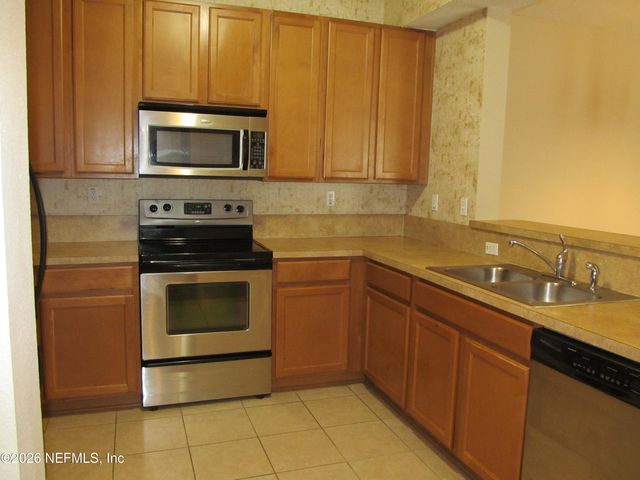 2200 MARSH HAWK Lane 306, Fleming Island, FL 32003