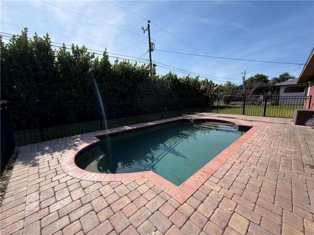 1410 SE 1st TER, CAPE CORAL, FL 33990 — exterior