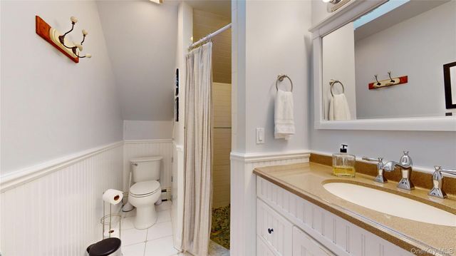 15 Walnut Avenue, East Quogue, NY 11942