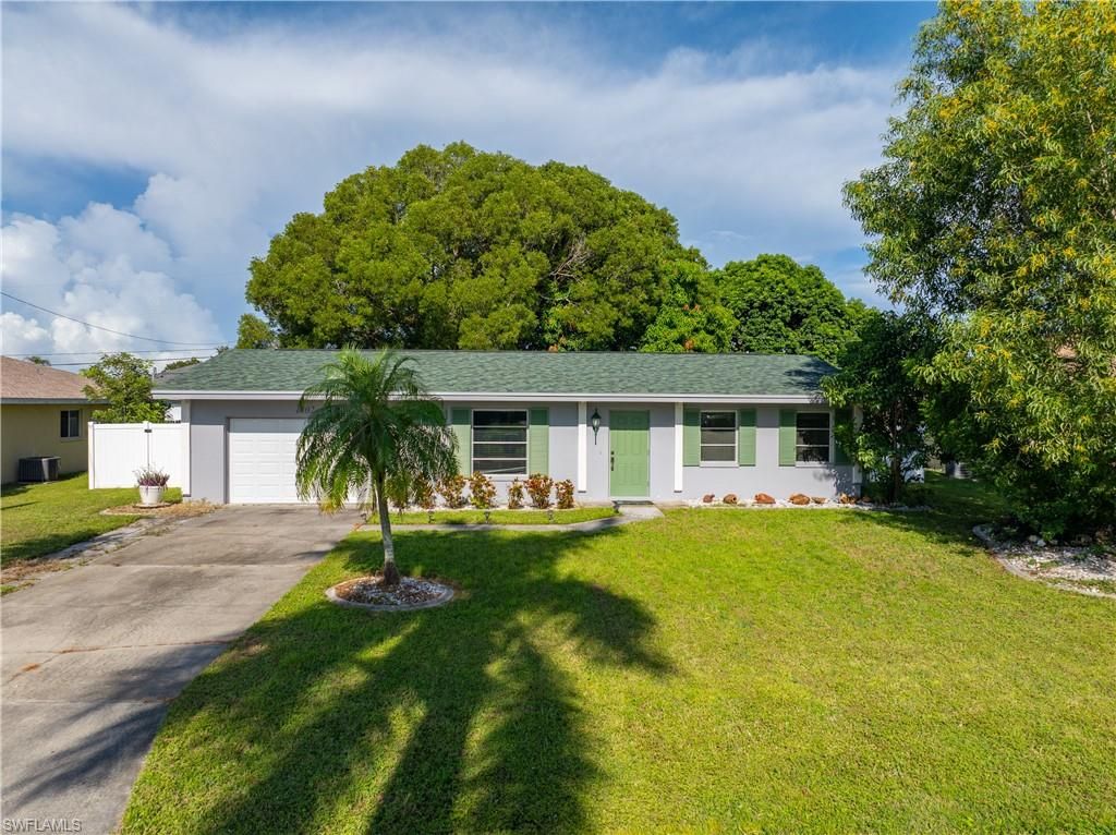 1402 SE 8th PL, CAPE CORAL, FL 33990 — exterior