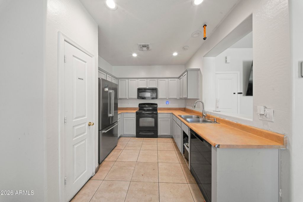 272 S ELISEO FELIX JR Way, Avondale, AZ 85323 — photo 5
