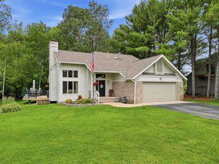 9551 Clubhouse Drive, Canadian Lakes, MI 49346