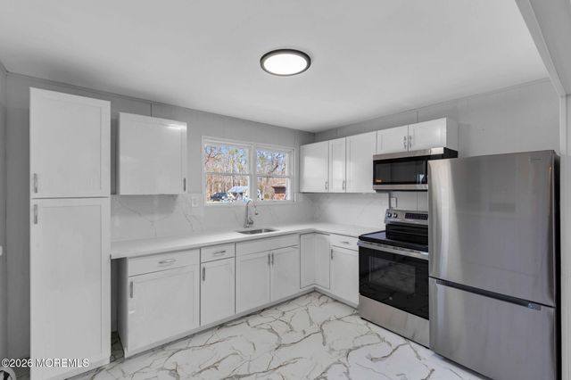 73 Maxim Road, Howell, NJ 07731