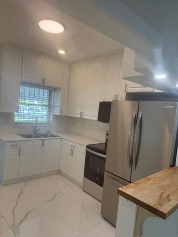 6410 NW Miami Court, Miami, FL 33150