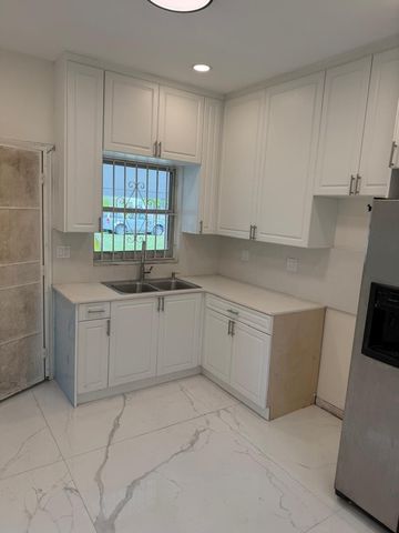 6410 NW Miami Court, Miami, FL 33150