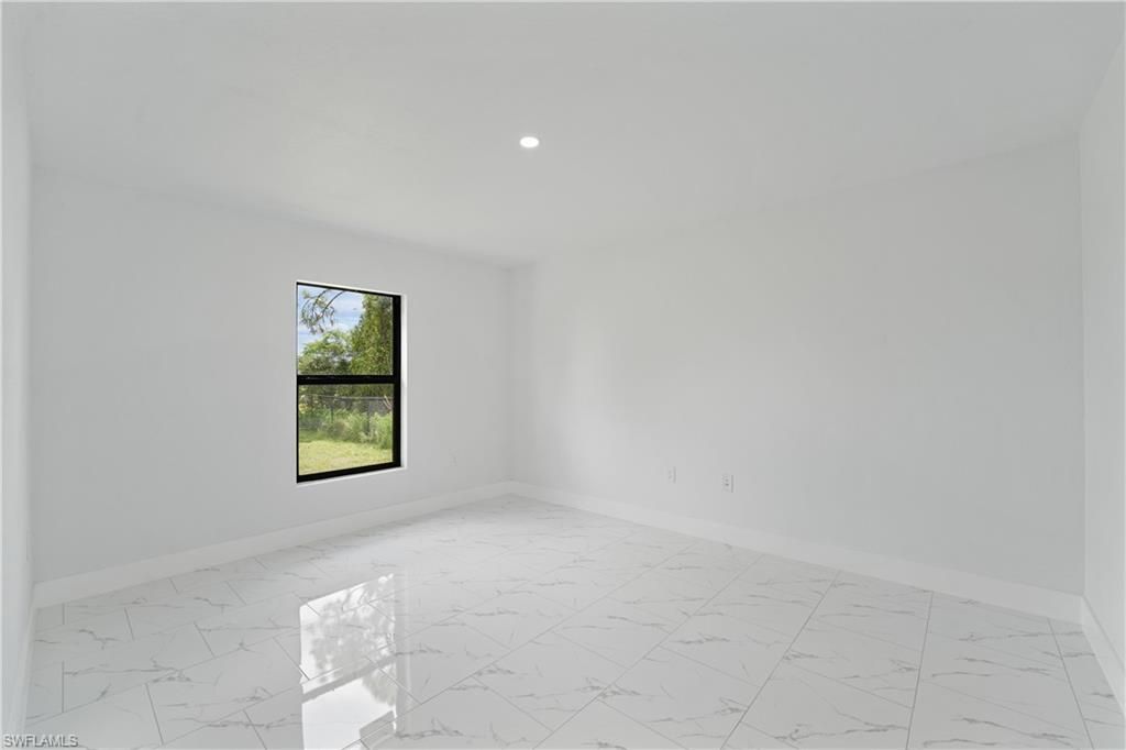 3003 Irene AVE S, LEHIGH ACRES, FL 33976 — photo 4