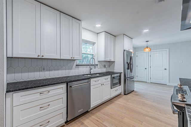 7229 Whispering Pines Drive, Dallas, TX 75248