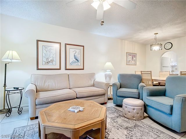 180 TURTLE LAKE CT 103, Naples, FL 34105