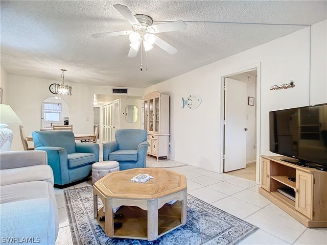 180 TURTLE LAKE CT 103, Naples, FL 34105