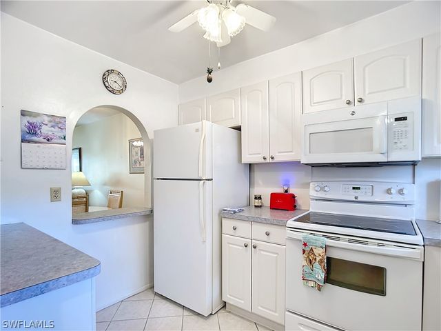 180 TURTLE LAKE CT 103, Naples, FL 34105