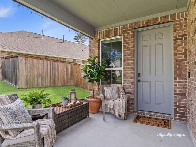 218 Woods Rose Court, Conroe, TX 77318