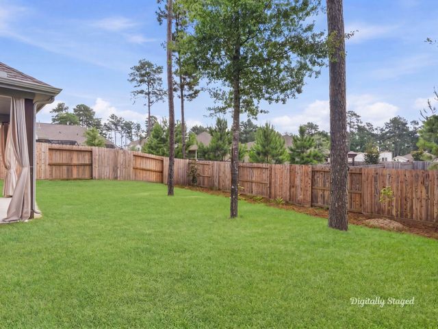 218 Woods Rose Court, Conroe, TX 77318