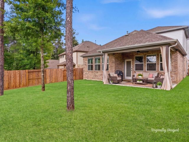 218 Woods Rose Court, Conroe, TX 77318