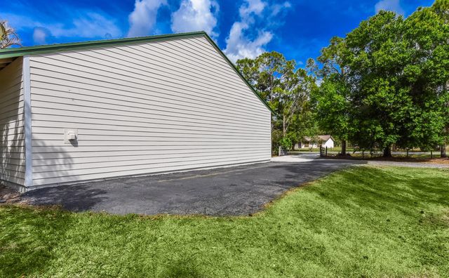 16244 E Downers Drive E, The Acreage, FL 33470