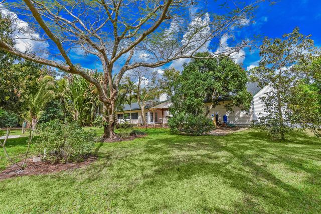 16244 E Downers Drive E, The Acreage, FL 33470