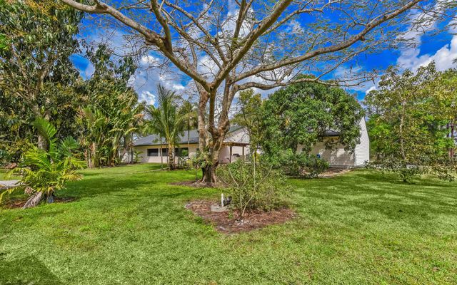 16244 E Downers Drive E, The Acreage, FL 33470