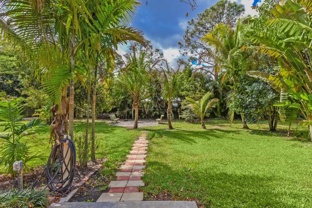 16244 E Downers Drive E, The Acreage, FL 33470