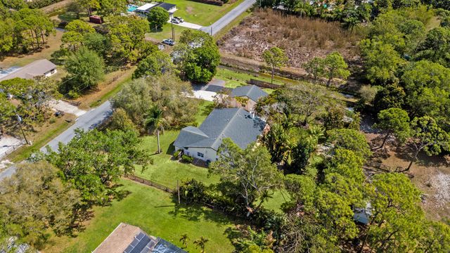 16244 E Downers Drive E, The Acreage, FL 33470