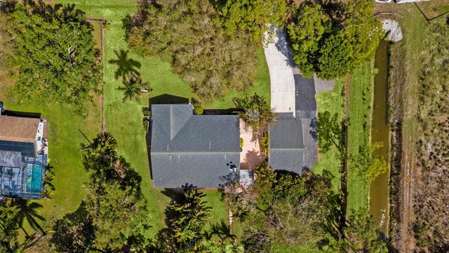 16244 E Downers Drive E, The Acreage, FL 33470
