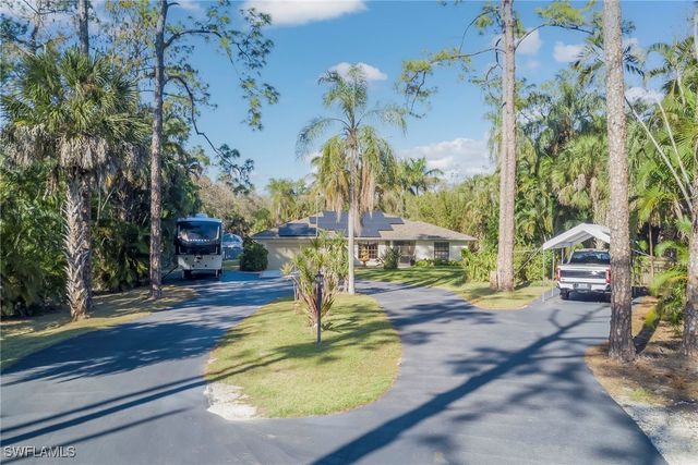 5423 Teak Wood DR, Naples, FL 34119