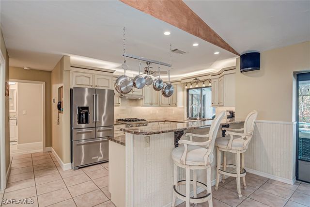 5423 Teak Wood DR, Naples, FL 34119