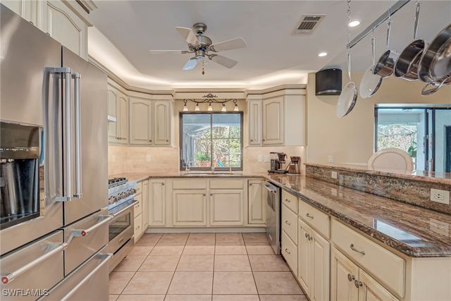 5423 Teak Wood DR, Naples, FL 34119