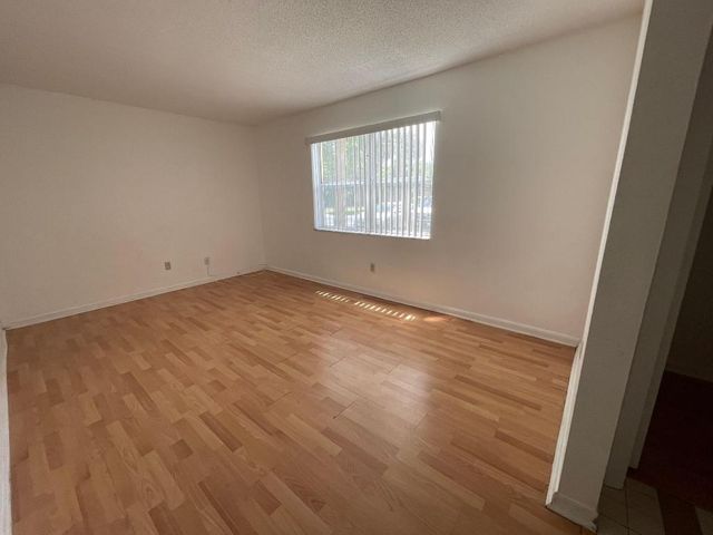 10762 La Placida Drive 7-108, Coral Springs, FL 33065