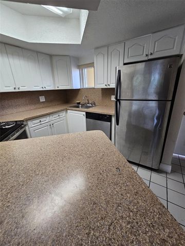 8245 Lake Dr 401, Doral, FL 33166