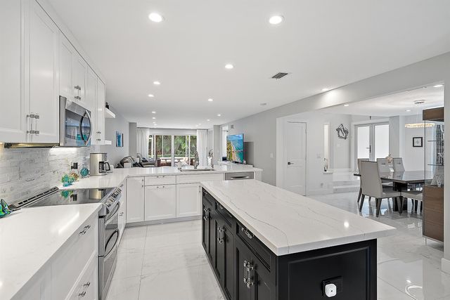 7 Grand Bay Circle, Juno Beach, FL 33408