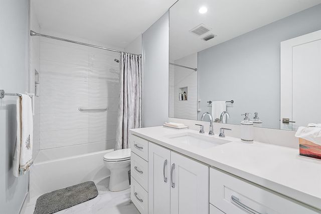 7 Grand Bay Circle, Juno Beach, FL 33408