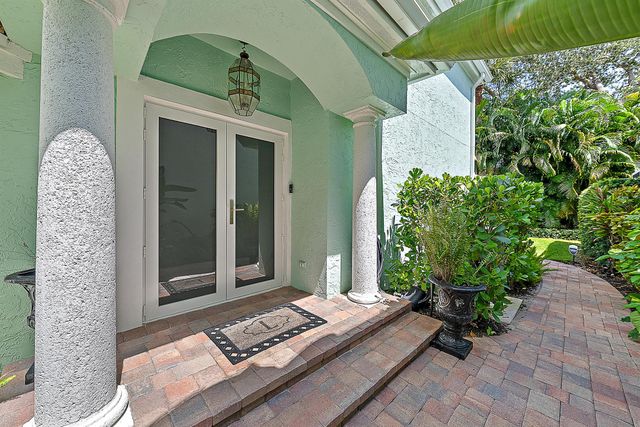 7 Grand Bay Circle, Juno Beach, FL 33408