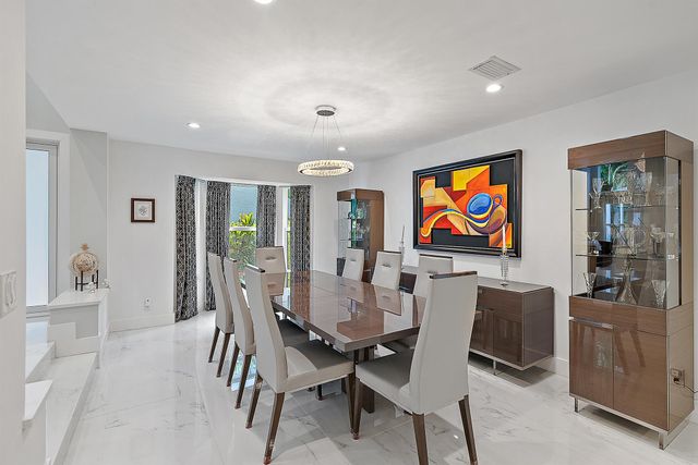 7 Grand Bay Circle, Juno Beach, FL 33408