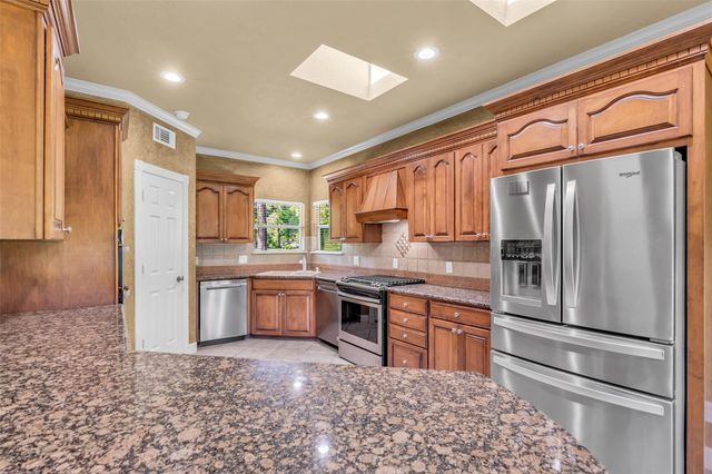 29015 Commons Oaks Drive, Huffman, TX 77336