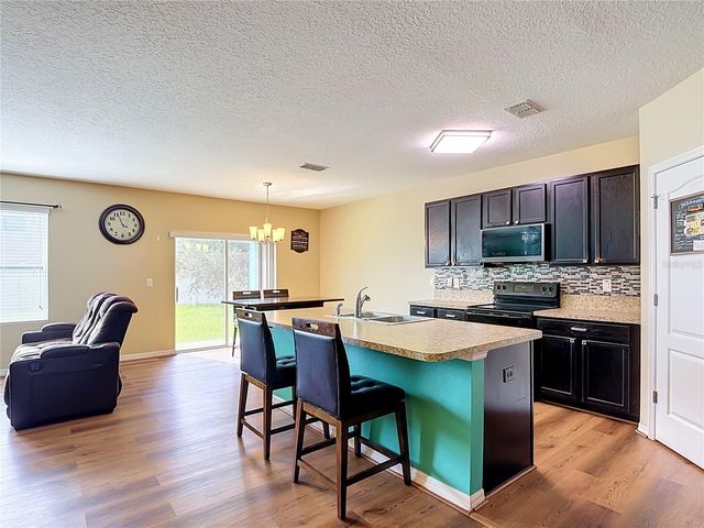 1450 SILVERADO FLATS STREET, Kissimmee, FL 34744