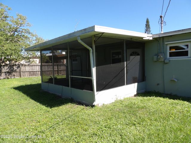 1148 Wild Rose Drive NE, Palm Bay, FL 32905