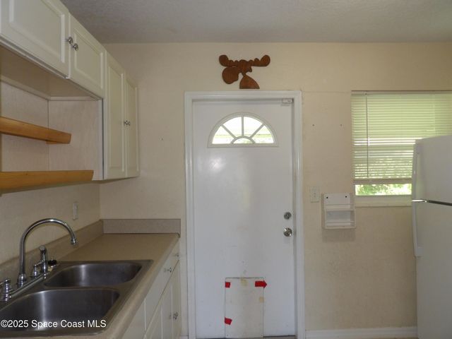 1148 Wild Rose Drive NE, Palm Bay, FL 32905