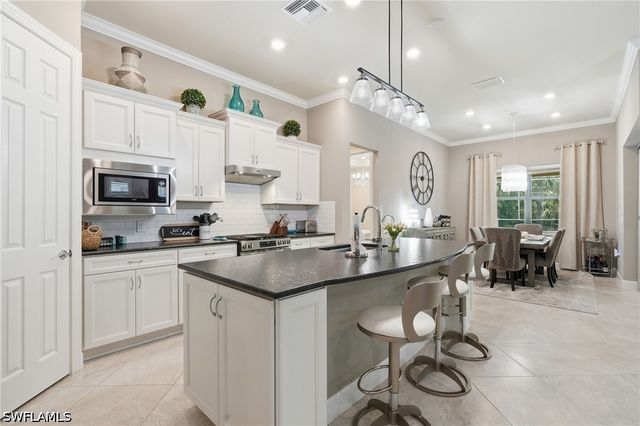 9432 Purple Martin CT, Naples, FL 34120