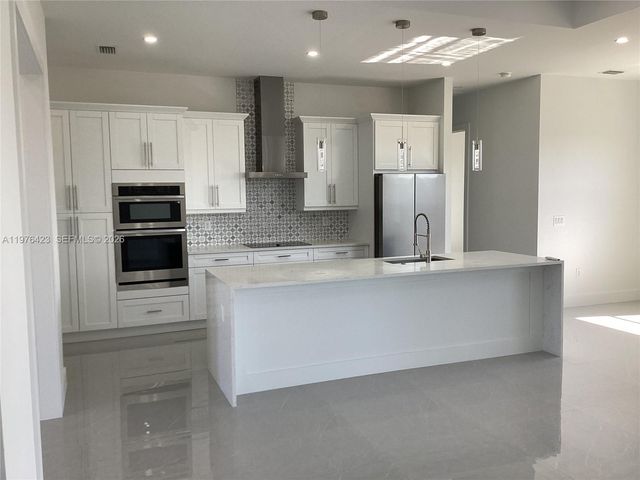 1120 NE 32nd Lane, Cape Coral, FL 33990