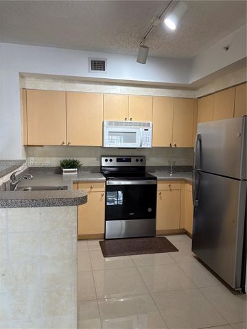 8030 N Nob Hill Road 105, Tamarac, FL 33321