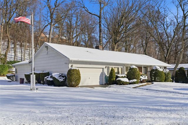 75 Mimosa Drive, East Hills, NY 11576