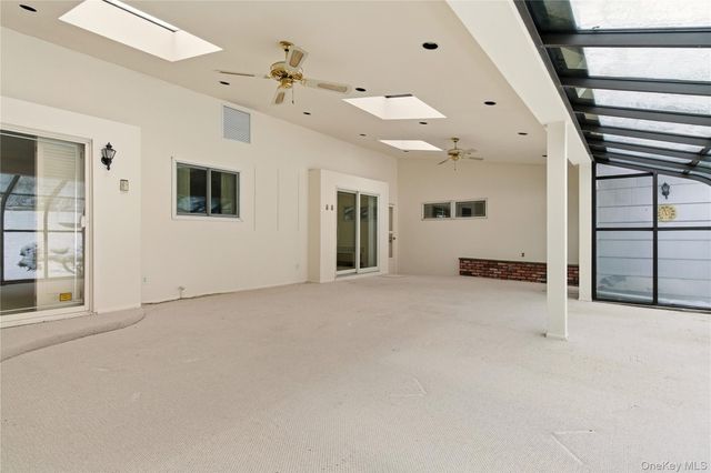 75 Mimosa Drive, East Hills, NY 11576