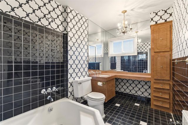 75 Mimosa Drive, East Hills, NY 11576