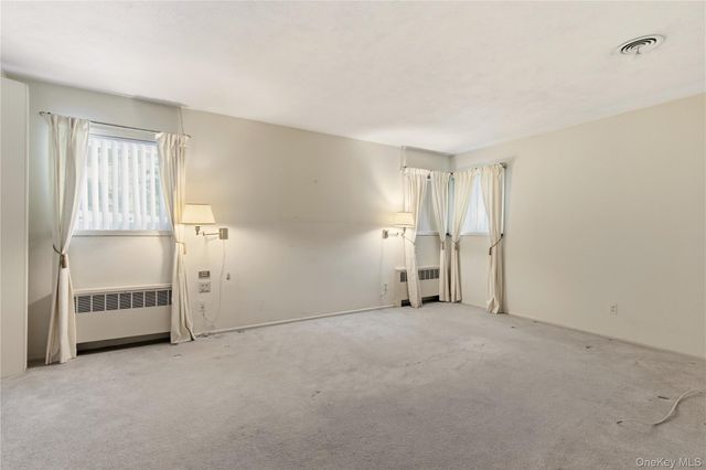 75 Mimosa Drive, East Hills, NY 11576