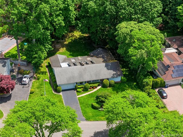 75 Mimosa Drive, East Hills, NY 11576