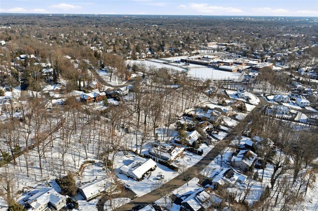 75 Mimosa Drive, East Hills, NY 11576